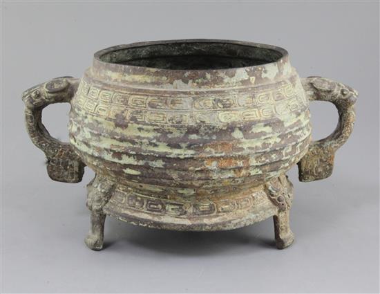 A large Chinese archaic bronze tripod ritual food vessel, Gui, late Western Zhou dynasty, 9th - 8th century B.C., 33.5cm x 18.5cm